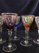 A Harlequin set of six wine glasses