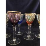 A Harlequin set of six wine glasses