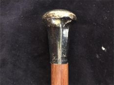 Two silver topped swagger sticks or canes