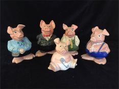 A full set of Natwest Piggy Banks by Wade with original folder