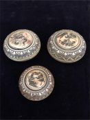 Three Chinese Antique worked ivory screw topped pill boxes