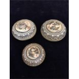 Three Chinese Antique worked ivory screw topped pill boxes