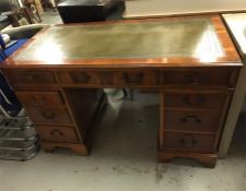 A Leather topped pedestal desk