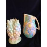 A Beswick Pineapple vase and a jug (Jug has slight chip to underside of handle)