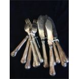 A set of silver handled fish knives and forks
