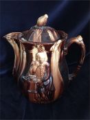 A treacle glaze teapot or jug with Shakespeare decoration AF