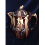 A treacle glaze teapot or jug with Shakespeare decoration AF