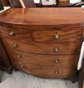 A Mahogany bow fronted chest of drawers, two over three.