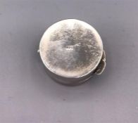 A Round silver pill box