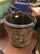 A wooden water bucket