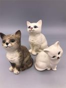 A Trio of Beswick China Cat figures