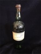 A Bottle of Vintage L Garnier Chartreuse liqueur 96 proof.