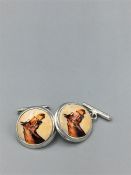 A Pair of Silver and Enamel cufflinks with pictorial image of a horse.