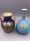 Two small vases in blue and gold including one by Spode