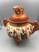 Chinese pot three footed with Foo Dog Finial to lid.