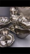 A selection of silver plated items to include, Mappjn & Webb sauce boat, serving dishes, After Eight