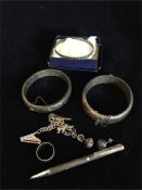 A selection of silver items to include bracelet by W Right Jewellers, pen, two wide silver