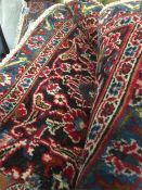 A Persian Design rug 3.78m x 2.83m..