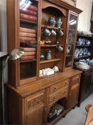 A Carved light oak dresser