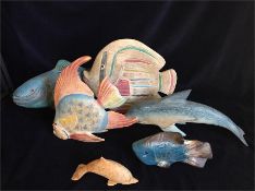 A Shoal of wooden tropical fish