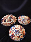 Trio of Imari plates with scalloped edge