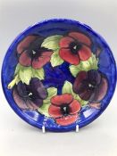 A William Moorcroft 'Pansy' plate c.1925