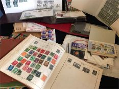 A Box of stamps to include pre and post decimal, UK and Worldwide and First Day Covers.