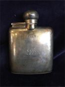 A Silver hip flask hallmarked Birmingham and engraved GB 11cm tall 120g