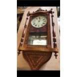 A Skarrat & Co Wall Clock with pendulum key etc but AF