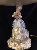 A Capodimonte lamp base in the figure of a lady.