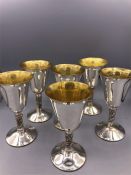 Set of six silver plate goblets with embossed stems