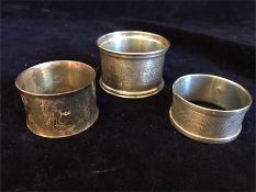 Three silver napkin rings