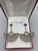 A Pair of silver and marcasite set earrings