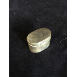 A silver pill box