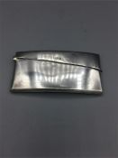 A hallmarked silver card case