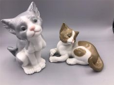 A Pair of Lladro cat figures