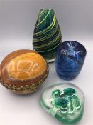 Pair of encased glass vases, decorative polished stone and a glass paperweight.