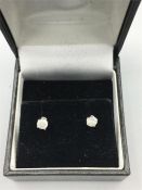 A pair of white gold Diamond Stud earrings of 40 points