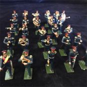 A Marching band of lead soldiers, hand painted.