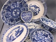 A selection of blue and white china to include bowls, plates and dishes