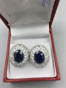 A Pair of large silver and sapphire earrings