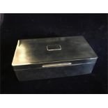 A Silver cigarette box, hallmarked Birmingham