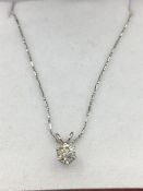 A 14ct white gold diamond pendant necklace of 48 points on 14ct white gold chain