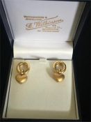 A pair of 18ct gold heart earrings