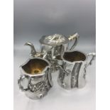 Chinese silver tea set from Shanghai with teapot, sugar bowl and milk jug.(1030g)
