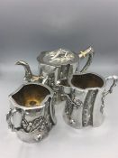 Chinese silver tea set from Shanghai with teapot, sugar bowl and milk jug.(1030g)