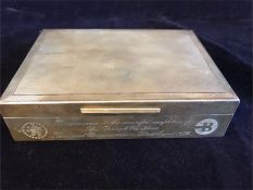 A hallmarked silver cigarette box