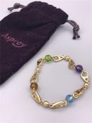 An Asprey A Chain Yellow gold and semi precious stone bracelet (Citrine, Ametyst, Peridot and