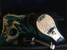 A set of Irish bagpipes in bagpipe carry case