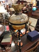 A Wrought Iron oil lamp, converted...
